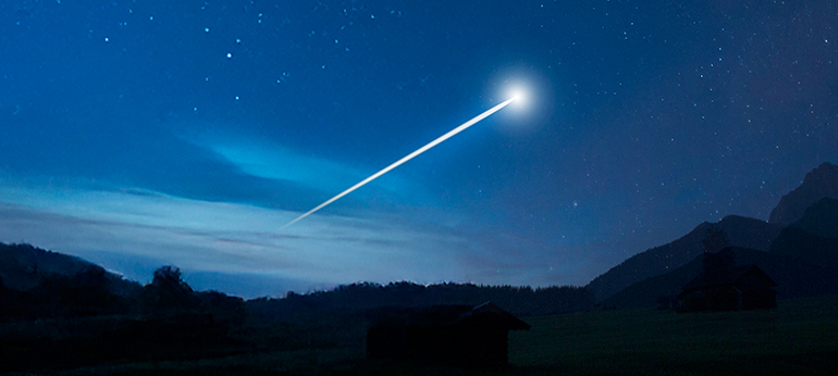 stella cometa su cielo blu notte